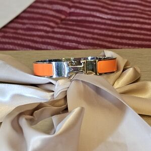 Hermes Orange and Silver Enamel Clic H Bracelet